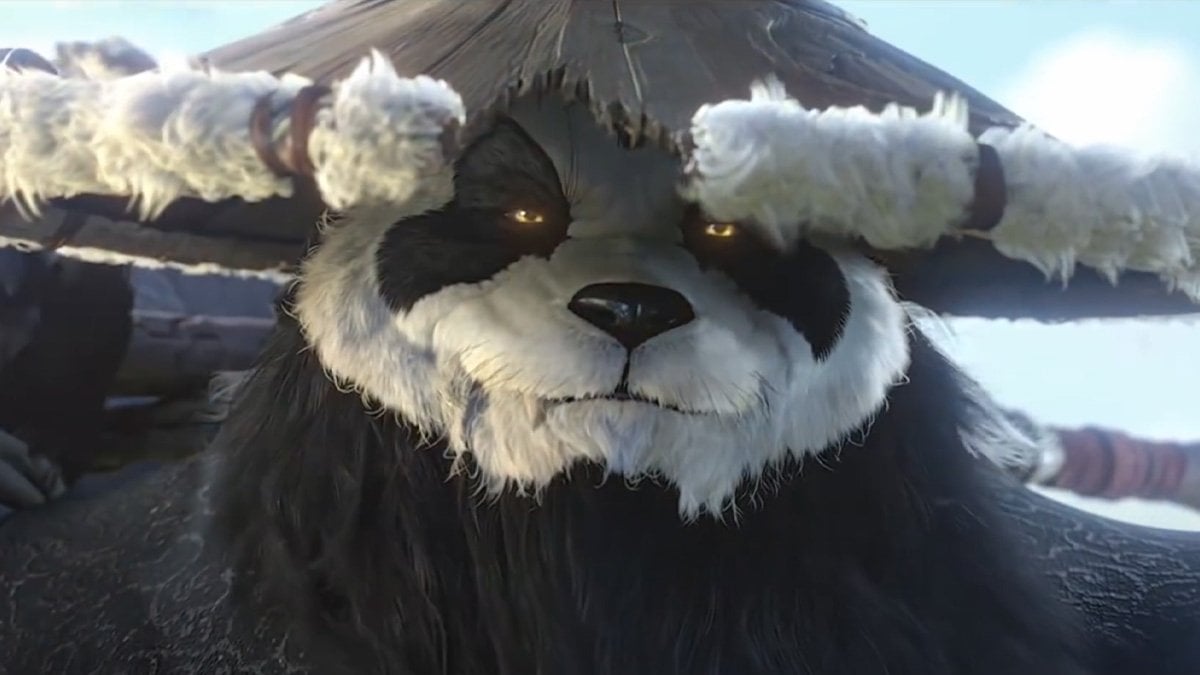 A smiling Monk Pandaren in WoW.